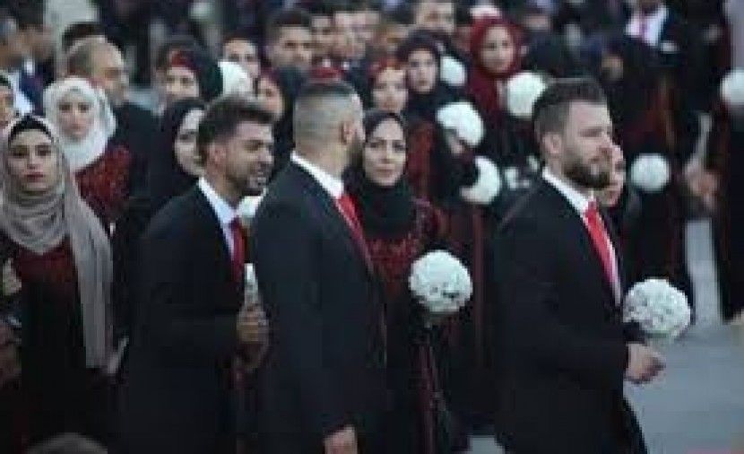 الرئاسة ومنظمة التحرير تنظمان عرساً جماعياً ل 400 عريس وعروس من المخيمات الفلسطينية بلبنان