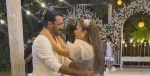 سر الرقصة المثيرة: كشف النقاب عن هوية صاحبة فيديو الرقص المثير مع الفنان محمد رجب في حفل الزفاف!