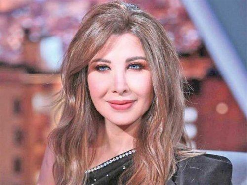 نانسي عجرم تتألق باللون الأبيض وتستعد لحفلها مع تامر حسني