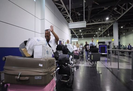 مطار القاهرة يستقبل آخر أفواج من بعثة الحج لوزارة الداخلية (صور)