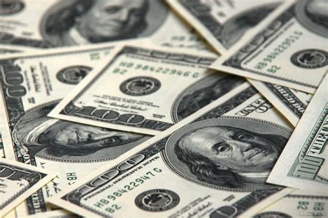 تفسير الدولار في الحلم رؤية الدولارات في المنام