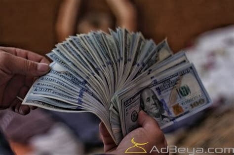 تفسير الدولار في الحلم رؤية الدولارات في المنام