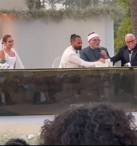 اللقطات الأولى من عقد قران أمينة خليل والمصور أحمد زعتر
