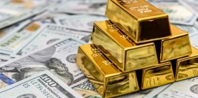 الذهب يهبط مع صعود الدولار
