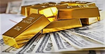 الذهب يهبط تحت ضغط الدولار